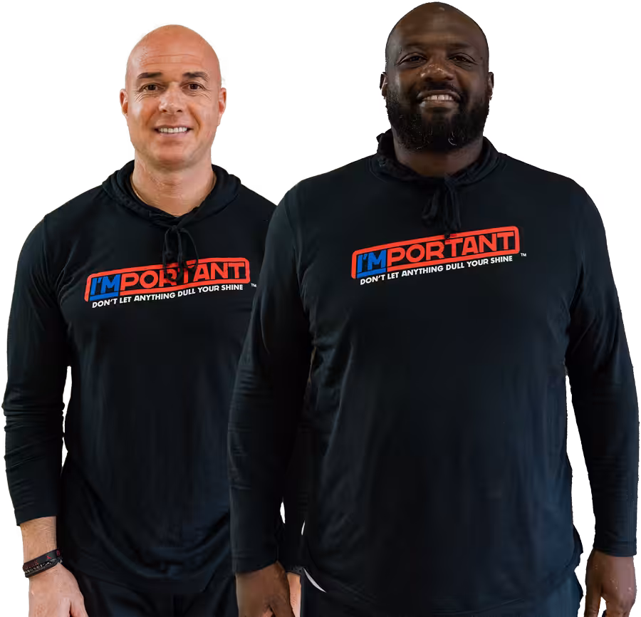 Alex and Brandon smiling on a transparent background