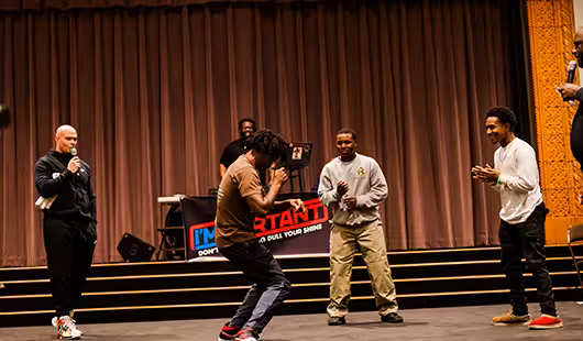 A man dancing on stage