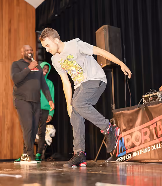 A man dancing on stage